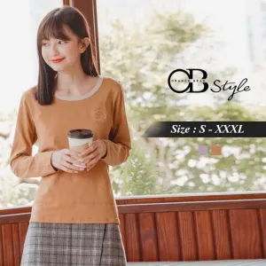 ORANGEBEAR DIP HEM EMBROIDERED TOPS